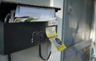 Sticky Note Advertisement on a Mailbox