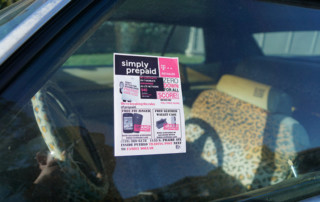 sticky flyer on car window