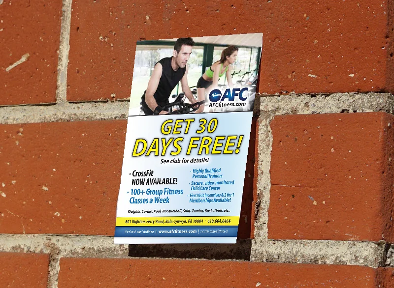 fitness studio advertisement flyer on wall